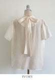 Ringo Pintuck Back Ribbon Short Sleeve Blouse