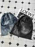 Rip denim pants bag