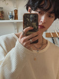 Loose fit ribbed U-neck knit