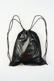 Metallic panel drawstring backpack