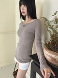 Teeret back slit cross strap punching U-neck off-shoulder long-sleeved T-shirt