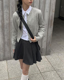 Rekdi Cable Knit Cardigan