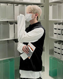 Coil collar open vest