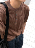 Cable knit short sleeve henry neck ver