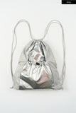 Metallic panel drawstring backpack