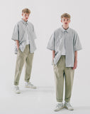 Deep tuck loose fit tapered banding pants