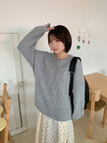 Kouni cable over round knit