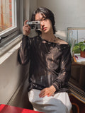 Damage snap see-through knit