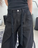 Pale studded strap pants