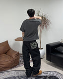 Karik graphic pocket denim pants