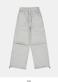 Out string glossy banding pants