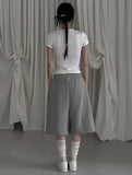 [mnem] pintuck logo bermuda shorts