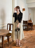 Hennua Half-Button See-Through Ribbed Cardigan