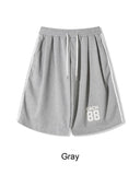 Petin embroidered track Bermuda pants
