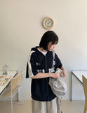 Naoki color matching lettering over short sleeve hood zip-up