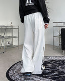 Rize side button track pants