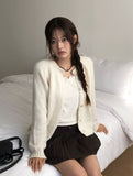Krang Wool Pleated Mini Belt Skirt