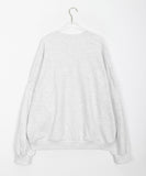 Lovendi lettering over sweatshirt