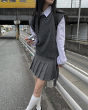 Dachi belted mini pleated skirt