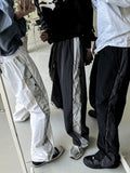 Cross string nylon pants