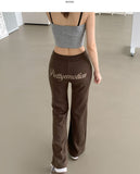Back Embroidery Point Semi Bootcut Banding Pants