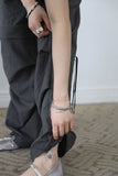 Small check back tape pants
