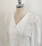 Lua V-neck Peplum Three Quarter Blouse