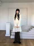 [MADE] Flute Ribbon Strap Punching Waves Knit One Piece