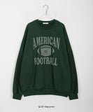 Lovendi lettering over sweatshirt