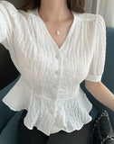 Betty V-neck Embossed Wrinkle Peplum Blouse