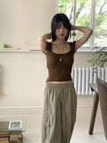Kundi back slit strap boucle short sleeve knit
