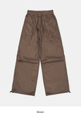 Out string glossy banding pants