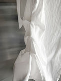 Notir Unbalanced Knot Blouse