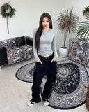 Heron embroidered denim pants