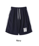 Petin embroidered track Bermuda pants