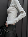 Metal pearl turtleneck