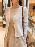 Kiet V-neck pendant knit cardigan