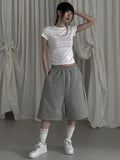 [mnem] pintuck logo bermuda shorts