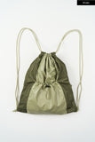 Metallic panel drawstring backpack