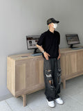 Ripped vintage damage black denim