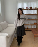 Tundro pintuck wool midi skirt