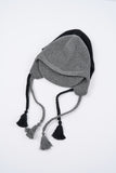 Braided knit earflap cap