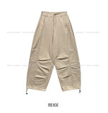 Foil-cut pintuck cotton balloon pants