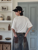 Late Back Leather Pocket Denim Pants