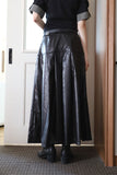 Bold Leather Pleated Skirt