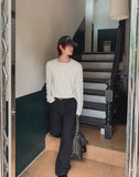 Curden Diagonal Cut Curved Bootcut Pants