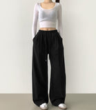 Nanspan banding pin tuck back cut mega wide pants