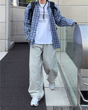 curd over check shirt