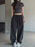 Color matching cross string nylon pants