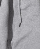 UNMEASURED LOGO TWO TUCK SWEAT PANTS